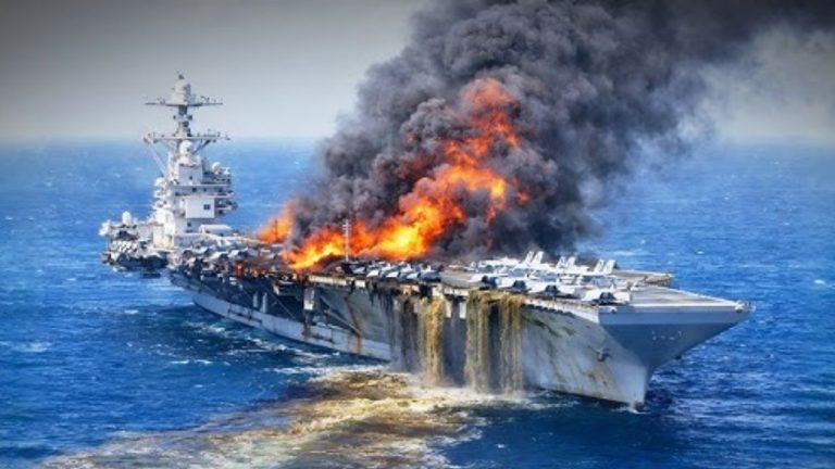 Fire damages major U.S. warship en route to repairs
